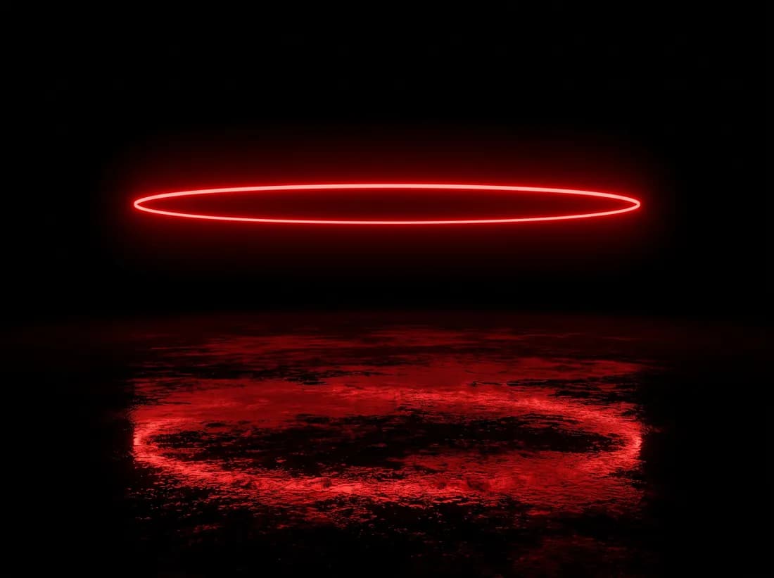 A single red neon ring suspended above a wet black floor.